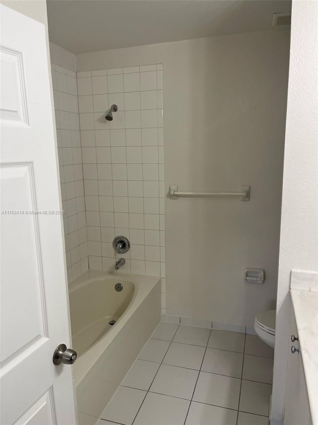 17347 NW 7th Ave Unit 907, Miami Gardens, FL 33169 - full bath featuring washtub / shower combination, tile patterned flooring, vanity, and toilet