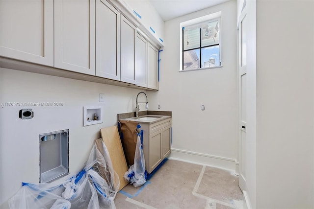 325 N Fairway N, Tequesta, FL 33469 - laundry area featuring electric dryer hookup, cabinet space, and hookup for a washing machine