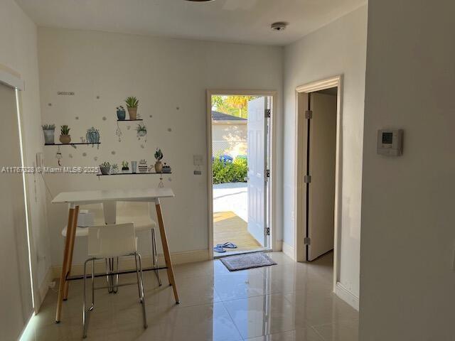 entryway with baseboards