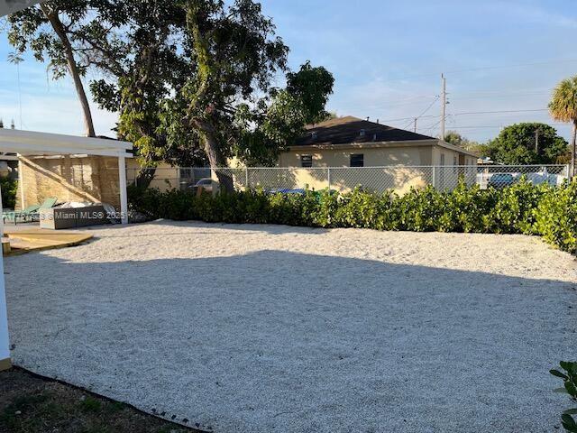 view of yard with fence