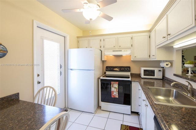 5000 NW 36th St Unit 509, Lauderdale Lakes, FL 33319 - kitchen featuring white appliances, ceiling fan, a sink, under cabinet range hood, and dark countertops