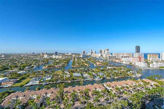 drone / aerial view with a view of city and a water view