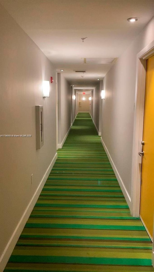 133 NE 2nd Ave Unit 1409, Miami, FL 33132 - hallway featuring recessed lighting, baseboards, and carpet floors