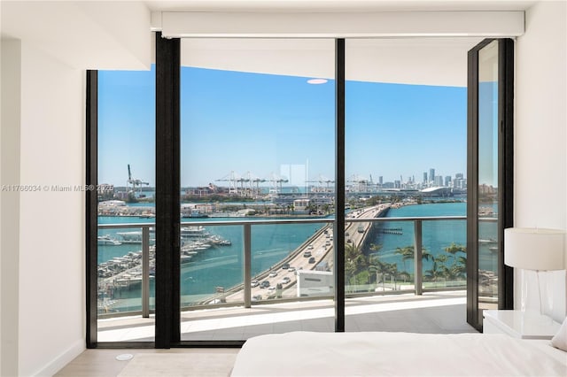 500 Alton Rd Unit 1201, Miami Beach, FL 33139 - bedroom with floor to ceiling windows, a city view, a water view, and multiple windows