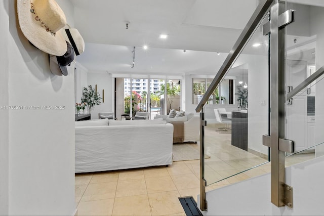 bedroom featuring light tile patterned flooring and recessed lighting