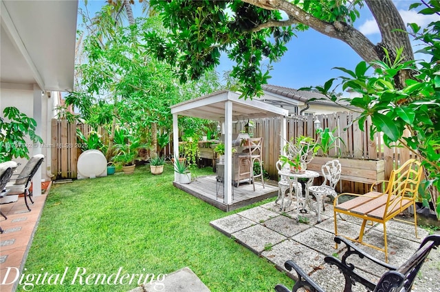 view of yard featuring a deck, a fenced backyard, and a patio area