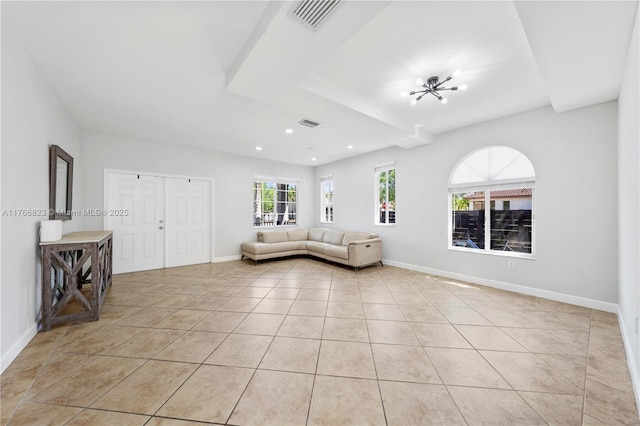 unfurnished living room with light tile patterned floors, visible vents, recessed lighting, and baseboards