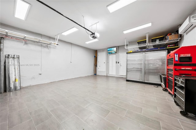 garage featuring a wall mounted air conditioner and a garage door opener