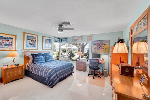 1431 S Ocean Blvd, Lauderdale By The Sea, FL 33062 - bedroom with a desk, a ceiling fan, light tile patterned floors, and a textured ceiling