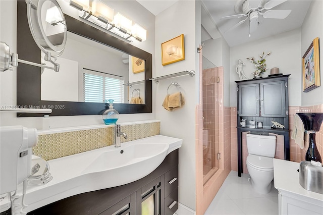 1431 S Ocean Blvd, Lauderdale By The Sea, FL 33062 - bathroom featuring tile patterned floors, toilet, a ceiling fan, a shower stall, and vanity