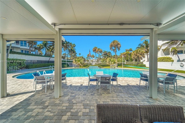 1431 S Ocean Blvd, Lauderdale By The Sea, FL 33062 - view of patio featuring a fenced in pool and fence