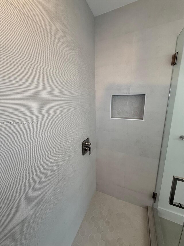 3431 NW 14th Ter, Miami, FL 33125 - full bath featuring tile patterned flooring and a shower stall