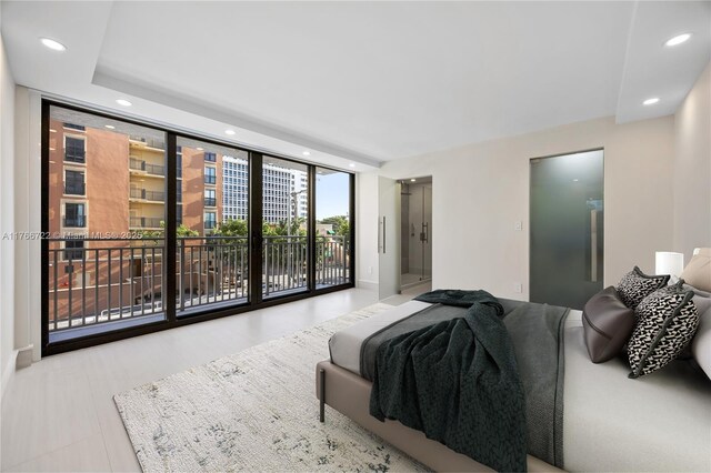 700 Coral Way Unit 2, Coral Gables, FL 33134 - bedroom with floor to ceiling windows, recessed lighting, and baseboards