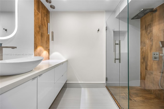 700 Coral Way Unit 2, Coral Gables, FL 33134 - full bath featuring a shower stall, vanity, and baseboards