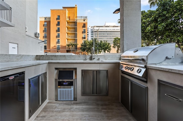 700 Coral Way Unit 2, Coral Gables, FL 33134 - view of patio / terrace with grilling area, a sink, exterior kitchen, and wine cooler
