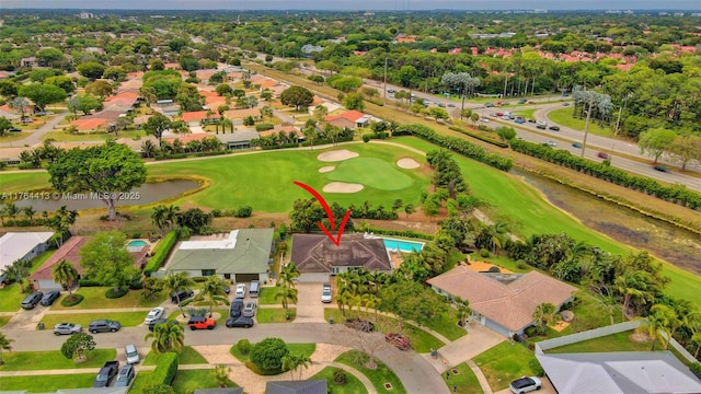 aerial view featuring a residential view and golf course view