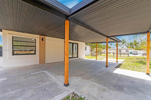 view of patio featuring fence