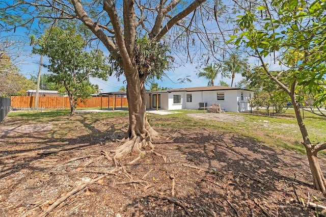 view of yard with a patio area and fence