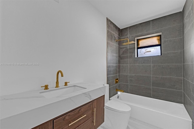bathroom featuring tub / shower combination, toilet, and vanity