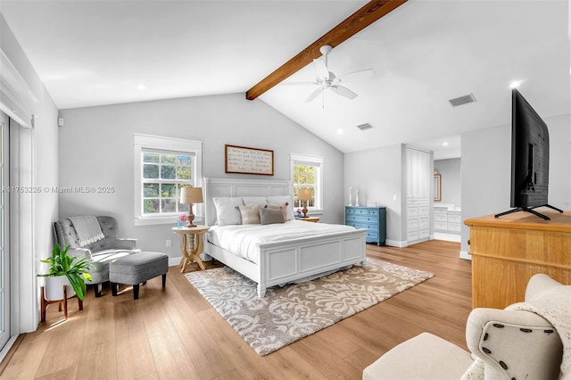 bedroom featuring visible vents, lofted ceiling with beams, and light wood-type flooring