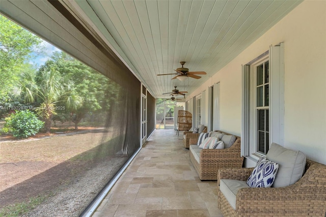view of patio featuring a ceiling fan