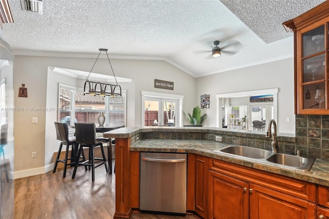 5081 SW 154th Pl, Miami, FL 33185 - kitchen with stainless steel refrigerator with ice dispenser, a textured ceiling, crown molding, vaulted ceiling, and light wood finished floors
