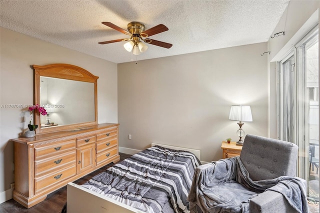 5081 SW 154th Pl, Miami, FL 33185 - sitting room with dark wood-style floors, baseboards, a textured ceiling, and ceiling fan