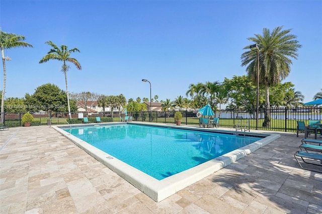 5081 SW 154th Pl, Miami, FL 33185 - community pool featuring a patio and fence