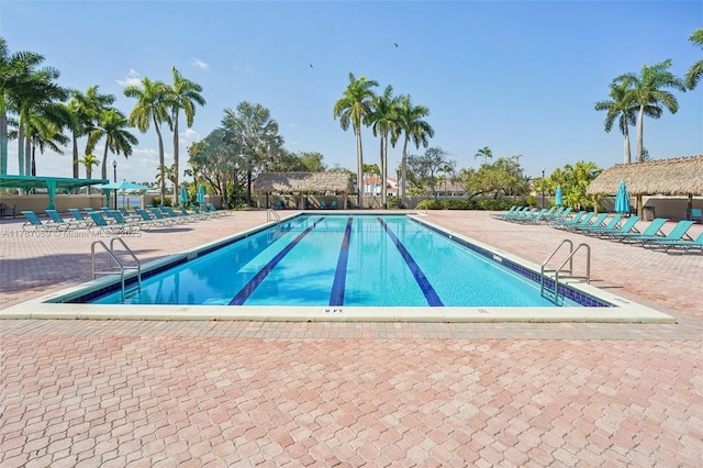 5081 SW 154th Pl, Miami, FL 33185 - community pool featuring a patio