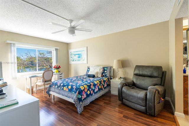 12900 SW 13th St Unit 211E, Pembroke Pines, FL 33027 - dining space with ceiling fan, a textured ceiling, light tile patterned floors, and baseboards