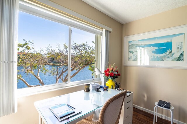 12900 SW 13th St Unit 211E, Pembroke Pines, FL 33027 - bedroom featuring wood finished floors, a textured ceiling, ceiling fan, and baseboards