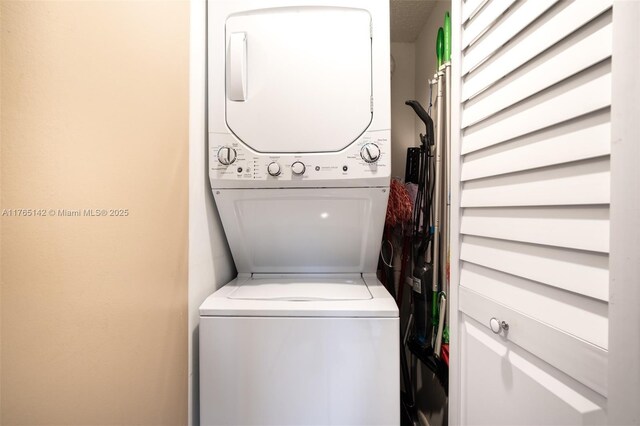 12900 SW 13th St Unit 211E, Pembroke Pines, FL 33027 - bedroom featuring wood finished floors and baseboards