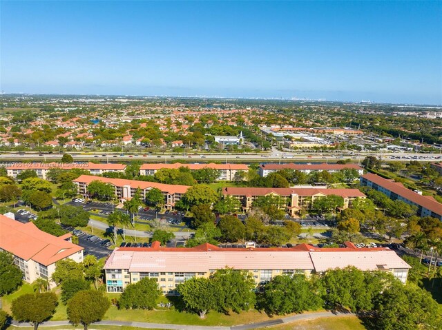 12900 SW 13th St Unit 211E, Pembroke Pines, FL 33027 - aerial view of a nearby body of water and apartment complex