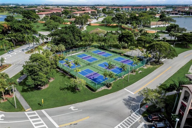 12900 SW 13th St Unit 211E, Pembroke Pines, FL 33027 - aerial view of residential area featuring a nearby body of water