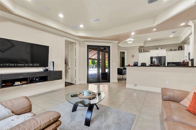 32006 SW 206th Ave, Homestead, FL 33030 - living room featuring a tray ceiling, light tile patterned floors, ornamental molding, and recessed lighting