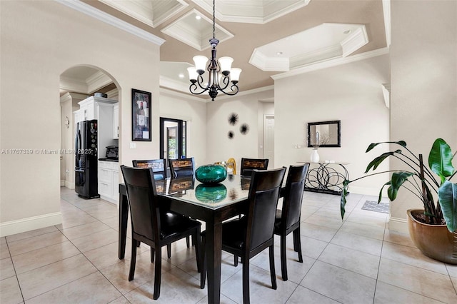 32006 SW 206th Ave, Homestead, FL 33030 - dining room with ornamental molding, a chandelier, arched walkways, light tile patterned floors, and recessed lighting