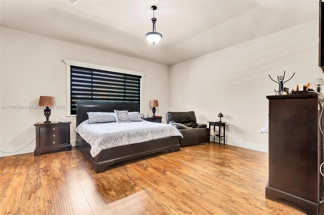 32006 SW 206th Ave, Homestead, FL 33030 - bedroom featuring wood finished floors and baseboards