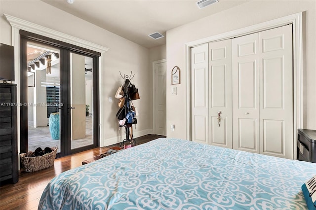 32006 SW 206th Ave, Homestead, FL 33030 - bedroom featuring access to outside, wood finished floors, a closet, and french doors