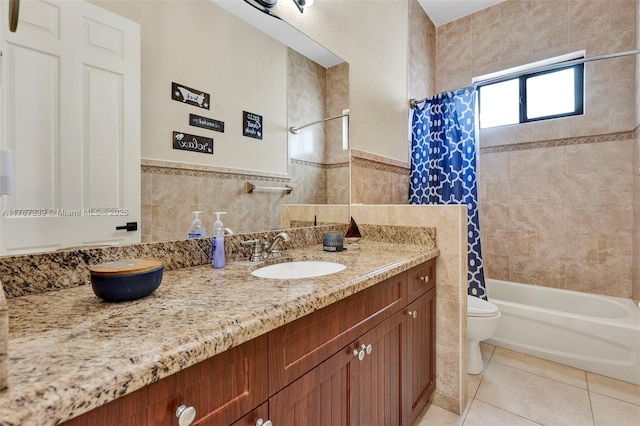 32006 SW 206th Ave, Homestead, FL 33030 - bathroom with tile walls, vanity, shower / tub combo with curtain, tile patterned floors, and a wainscoted wall