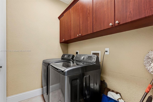 32006 SW 206th Ave, Homestead, FL 33030 - laundry area with cabinet space, separate washer and dryer, and tile patterned flooring