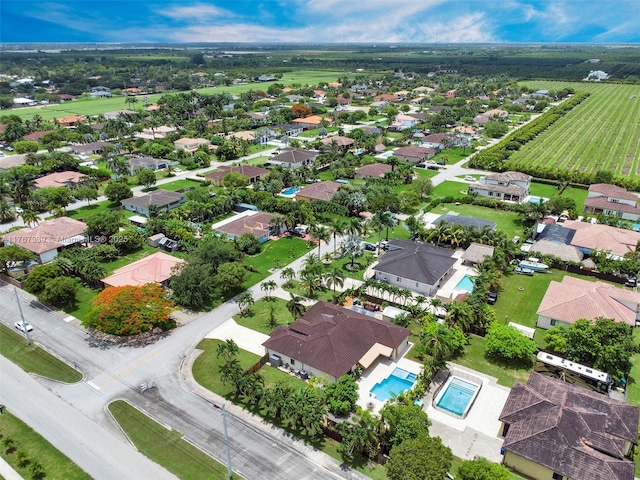 32006 SW 206th Ave, Homestead, FL 33030 - aerial view of property and surrounding area featuring a pool and nearby suburban area