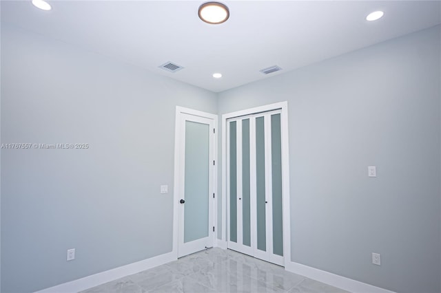 1254 S Ellipse St E, Lehigh Acres, FL 33974 - unfurnished bedroom featuring baseboards, a closet, recessed lighting, and visible vents