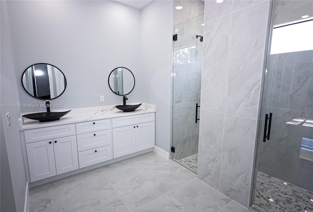 1254 S Ellipse St E, Lehigh Acres, FL 33974 - full bath featuring a sink, a shower stall, double vanity, and marble finish floor