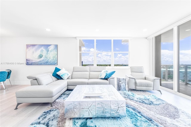 2501 S Ocean Dr Unit 536, Hollywood, FL 33019 - living room with expansive windows, recessed lighting, and wood finished floors