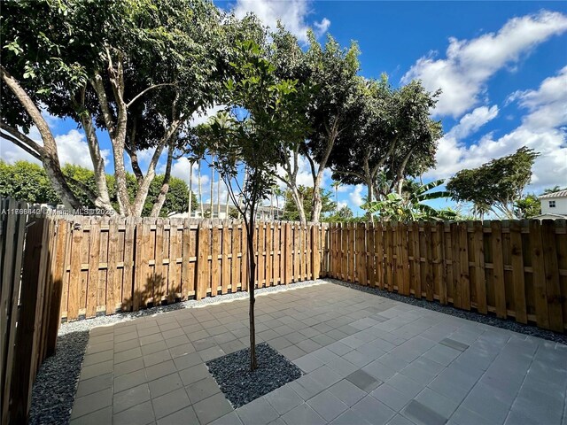 2737 SE 17th St, Homestead, FL 33035 - view of patio / terrace with fence