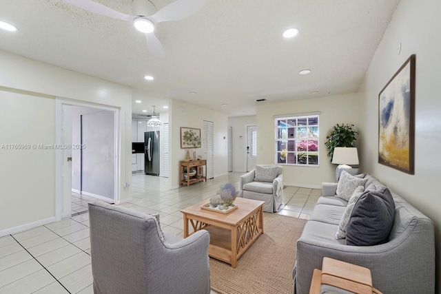 living room with recessed lighting, baseboards, light tile patterned flooring, and a ceiling fan