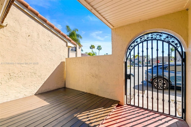 wooden terrace with a gate