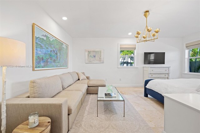 3120 Virginia St Unit 3120, Miami, FL 33133 - living area featuring a chandelier, recessed lighting, and baseboards