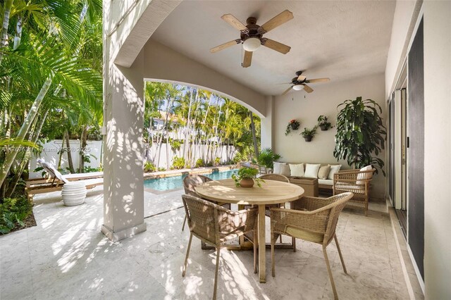 3120 Virginia St Unit 3120, Miami, FL 33133 - fenced backyard featuring a patio, a ceiling fan, and outdoor dining area