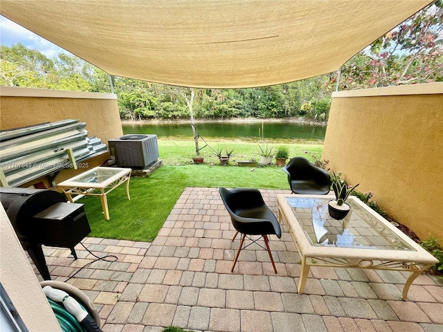983 SW 143rd Ave Unit 1403, Pembroke Pines, FL 33027 - view of patio / terrace with a water view